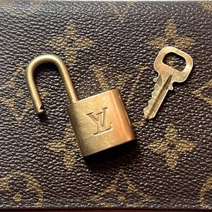 Louis Vuitton Lock and Key.  #303